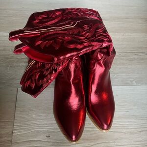 Brand new metallic red cowboy boots. Never worn.